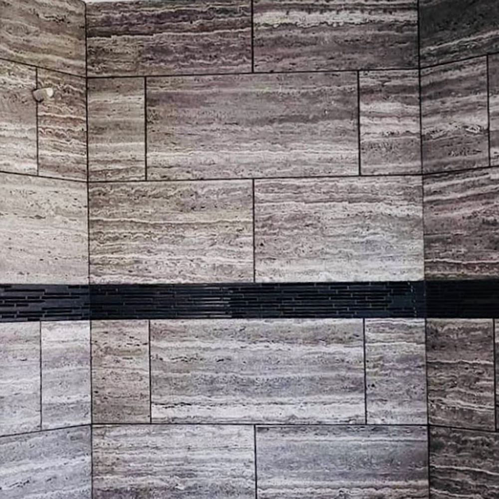 12 x 24 inch Sant'Agostino tile with a black glass accent strip 12 x 24 inch Sant'Agostino tile with a black glass accent strip